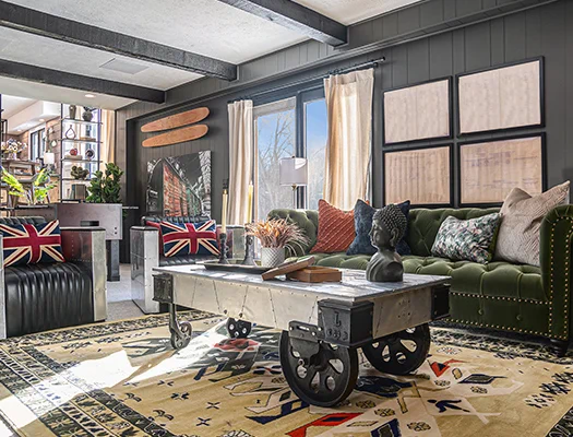Industrial living room with green velvet sofa and metal coffee table