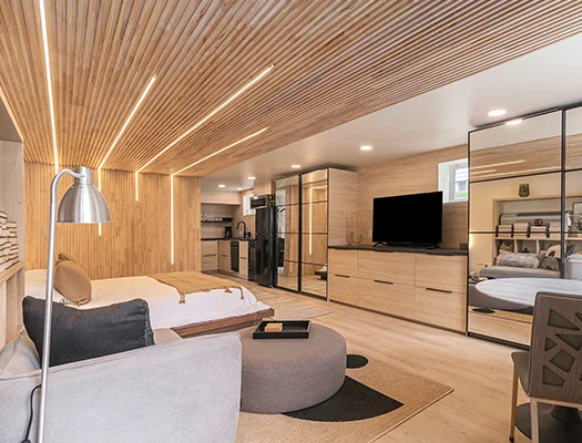 Modern luxury Airbnb studio with wood finishes